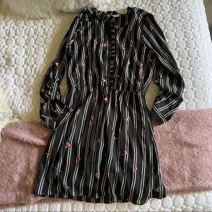 Black dress with bird detailing